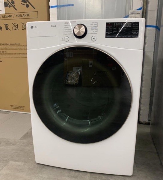 Front-load dryer on the appliance floor
